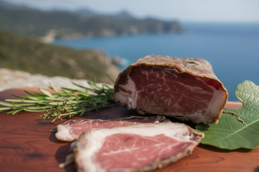 thinly sliced Lonzu with its characteristic ruby red and nutty fat strip